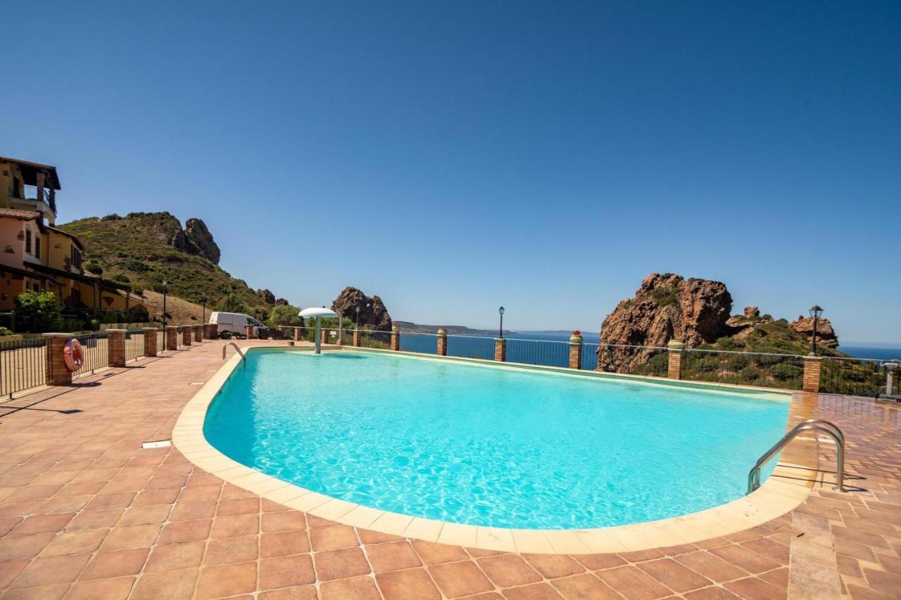 L'Estasi Tanca Piras A Bordo Piscina Con Vista Mare Villa Nebida Buitenkant foto
