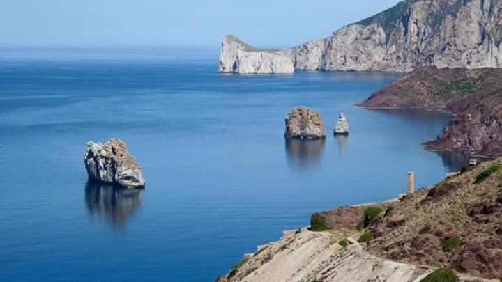 L'Estasi Tanca Piras A Bordo Piscina Con Vista Mare Villa Nebida Buitenkant foto